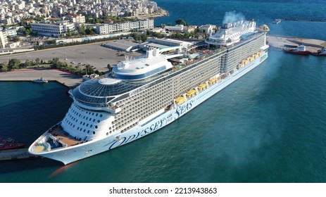 Piraeus Port, Attica - Greece - September 27 2022: Aerial Drone Photo Of Huge Brand New Cruise Liner Odyssey Of The Seas Anchored In Port Of Piraeus