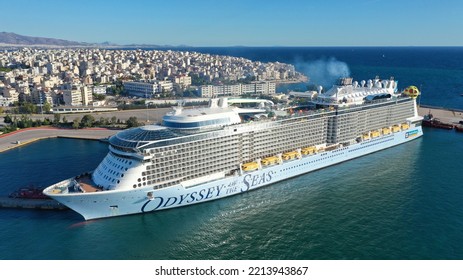 Piraeus Port, Attica - Greece - September 27 2022: Aerial Drone Photo Of Huge Brand New Cruise Liner Odyssey Of The Seas Anchored In Port Of Piraeus