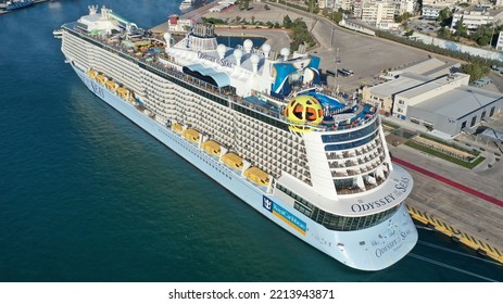 Piraeus Port, Attica - Greece - September 27 2022: Aerial Drone Photo Of Huge Brand New Cruise Liner Odyssey Of The Seas Anchored In Port Of Piraeus