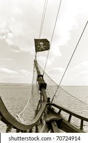 A Pirate Flag On The Bow Of The Ship