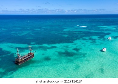 Pirate Ship Floating In Caribbean Sea. It Is Popular Excursion For Tourists. Dominican Republic. Aerial View