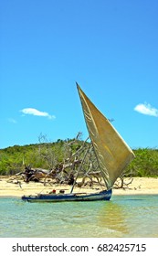 Pirogue Beach Seaweed In Indian Ocean Madagascar  People   Sand Isle      Sky    And Rock