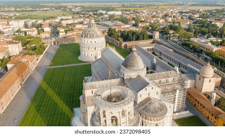 Pisa, Italy. The famous city with the leaning tower. Pisa Cathedral in Piazza dei Miracoli. Summer. Morning hours, Aerial View  