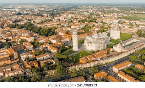 Pisa, Italy. Famous Leaning Tower and Pisa Cathedral in Piazza dei Miracoli. Summer. Morning hours, Aerial View   - Powered by Shutterstock