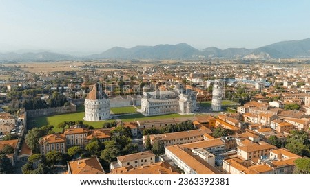 Pisa, Italy. The famous Leaning Tower and Pisa Cathedral in Piazza dei Miracoli. Summer. Evening hours, Aerial View  