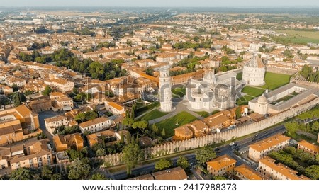 Pisa, Italy. Famous Leaning Tower and Pisa Cathedral in Piazza dei Miracoli. Summer. Morning hours, Aerial View  
