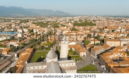 Pisa, Italy. The famous Leaning Tower and Pisa Cathedral in Piazza dei Miracoli. Summer. Evening hours, Aerial View  