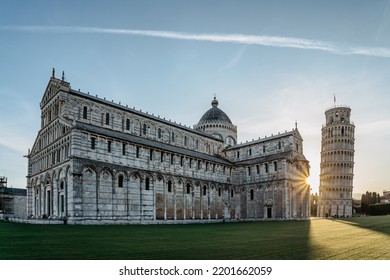 Pisa,Italy-May 13,2022. Sunrise At Famous Leaning Tower,freestanding Bell Tower Of Pisa Cathedral And Baptistry.Italian Architecture.UNESCO Site.Piazza Dei Miracoli In Tuscany.Sunny Day No People