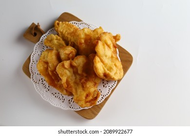 Pisang Goreng Or Banana Fritter Or Fried Banana Serve In White Plate With White Background