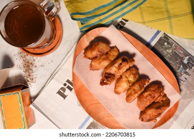 Pisang Goreng; Indonesian Fried Bananas Served With Hot Tea In The Night Time. 