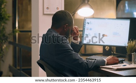 Pissed off computer operator fed up with loud colleague listening to music and pretending to beat drums at work. Businessman annoyed by bothersome coworker perturbing him in office