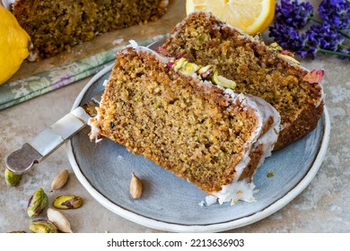 Pistachio, cardamom and lemon drizzle cake - Shutterstock ID 2213636903