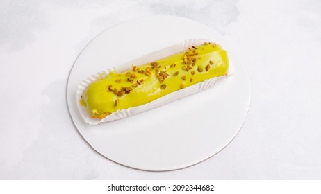 Pistachio Eclair Isolated On White Close Up