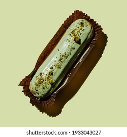 Pistachio Eclair On Green Background