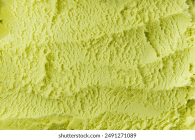 Pistachio ice cream detailed macro texture. Texture pistachio ice cream. Top view. Food concept. Blank for design.