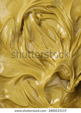 Pistachio paste texture, Pistachio spreadable cream close up, Pistachio spread, Dubai chocolate	