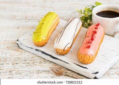 Pistachio, Vanilla, Strawberry Eclair In Glaze