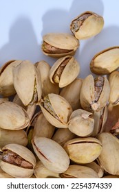 Pistachios green nuts in shell snack - Shutterstock ID 2254374339