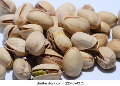 Pistachios green nuts in shell snack - Shutterstock ID 2254374371