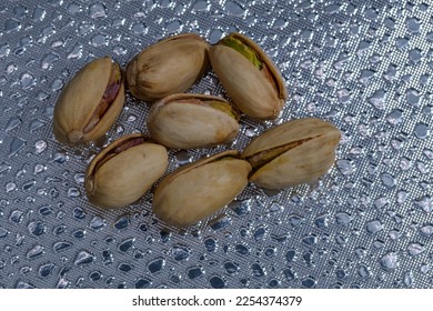 Pistachios green nuts in shell snack - Shutterstock ID 2254374379