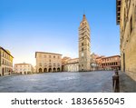 Pistoia, Italy. Panorama of Piazza del Duomo square with old Town Hall and Cathedral of San Zeno on sunrise