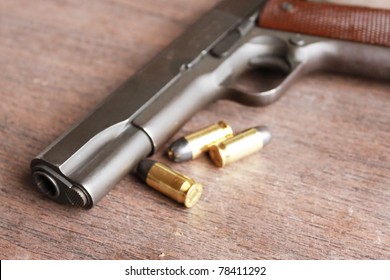 Pistol and bullets
