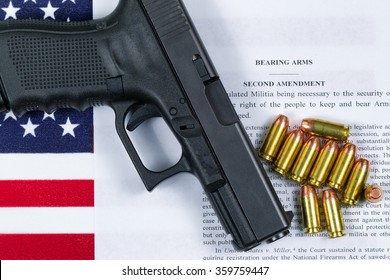 Pistol, bullets, USA flag and Text of second amendment for the right to bear arms. 