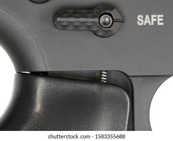 Pistol Grip On An AR-15 Loosened To Show Spring Underneath