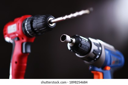 A Pistol-grip Cordless Drill And A Screw Gun.