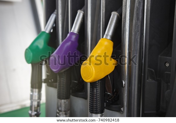 Pistols on gas station\
close-up