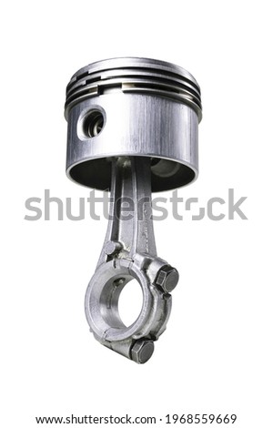 Piston and connecting rod of a small internal combustion engine. Spare parts for engine repair and regeneration.  Isolated background.