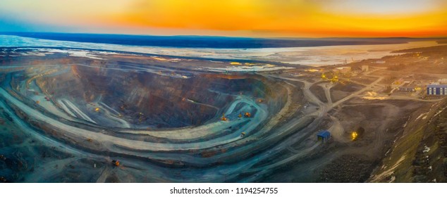 Pit Gold Mining In Russia, Siberia, A Landscape At Sunset, Shooting From Air