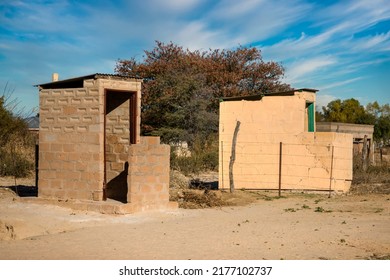 pit latrine toilet in the yard, african village