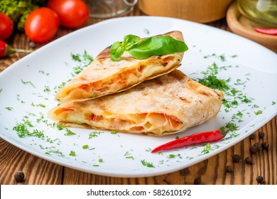 Pita Bread With Cheese On The Plate