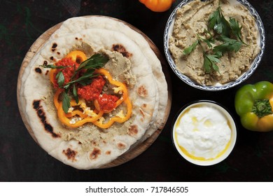 Pita Bread, Turkish Or Lebanese Flatbread With Hummus And Pepper Relish