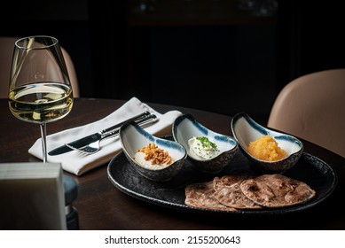 Pita With Different Dips And White Wine