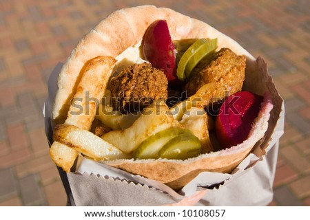 Pita with falafel. Ethnic mediterranean food. Stock photo © 