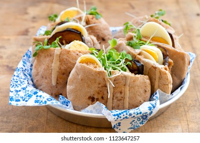 Pita Sabich Sandwich - Pita Stuffed With Fried Eggplant And Hard Boiled Eggs Iraqi Jews