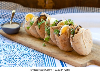 Pita Sabich Sandwich - Pita Stuffed With Fried Eggplant And Hard Boiled Eggs Iraqi Jews