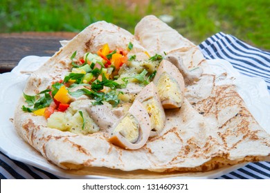 Pita Sabich Sandwich - Pita Stuffed With Fried Eggplant And Hard Boiled Eggs Iraqi Jews