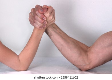 Pitched Uneven Arm Wrestling Match