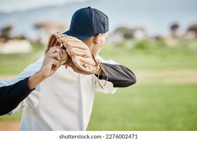 Pitcher, back view or sports man in baseball stadium in a game on training field outdoors. Fitness, young softball athlete or focused man pitching or throwing a ball with glove in workout or exercise - Powered by Shutterstock