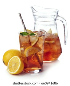 Pitcher With Glass Of Lemon Ice Tea Isolated On White Background