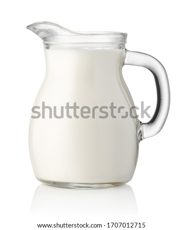 Pitcher of milk isolated on white background. Clipping path. Glass jug Foto stock © 