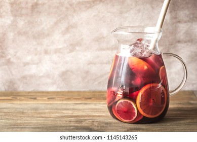 A pitcher of Spanish fruit Sangria - Shutterstock ID 1145143265
