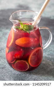 A pitcher of Spanish fruit Sangria - Shutterstock ID 1145209517