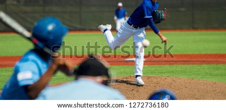 Pitcher and third baseman during a baseball game