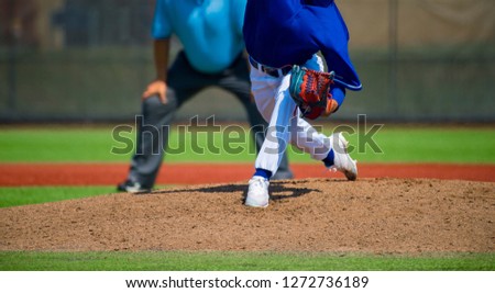 Pitcher and third baseman during a baseball game