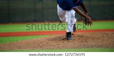 Pitcher and third baseman during a baseball game