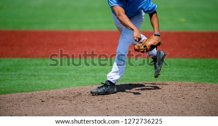 Pitcher and third baseman during a baseball game